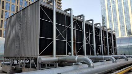 為什么現(xiàn)在商城很少用冷卻塔的中央空調(diào)了?